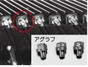 弦押さえとアグラフの写真